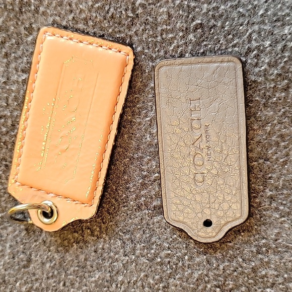 Coach Handbags - Coach leather hangtags - bundle of 2...peach & grey